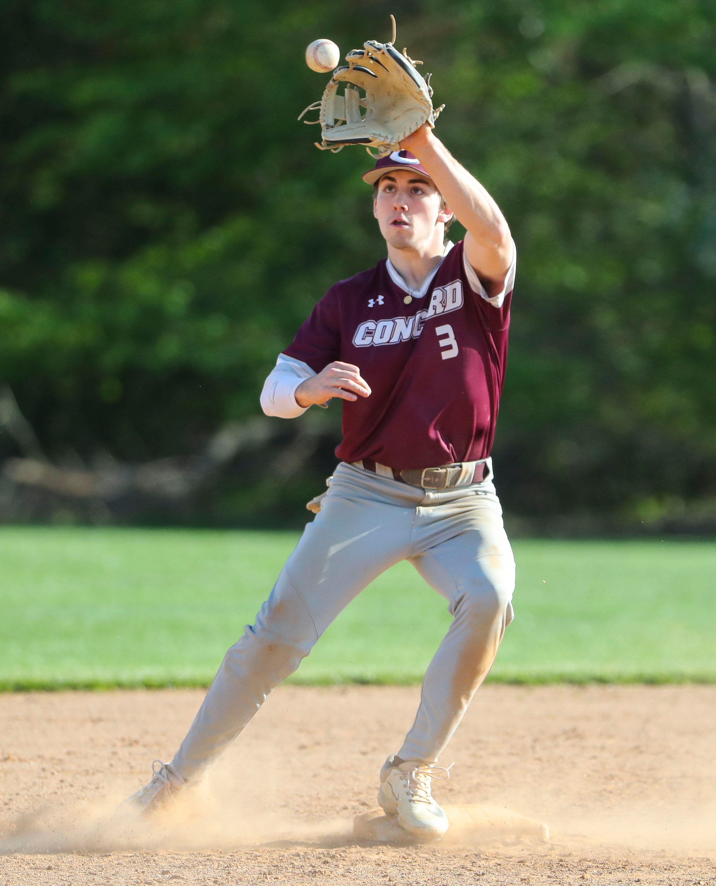 Concord's Jack Pope pulls in a throw for the first half of a double play in the sixth inning in Concord's 3-1 win at Brandywine High School, Tuesday, April 23, 2024.